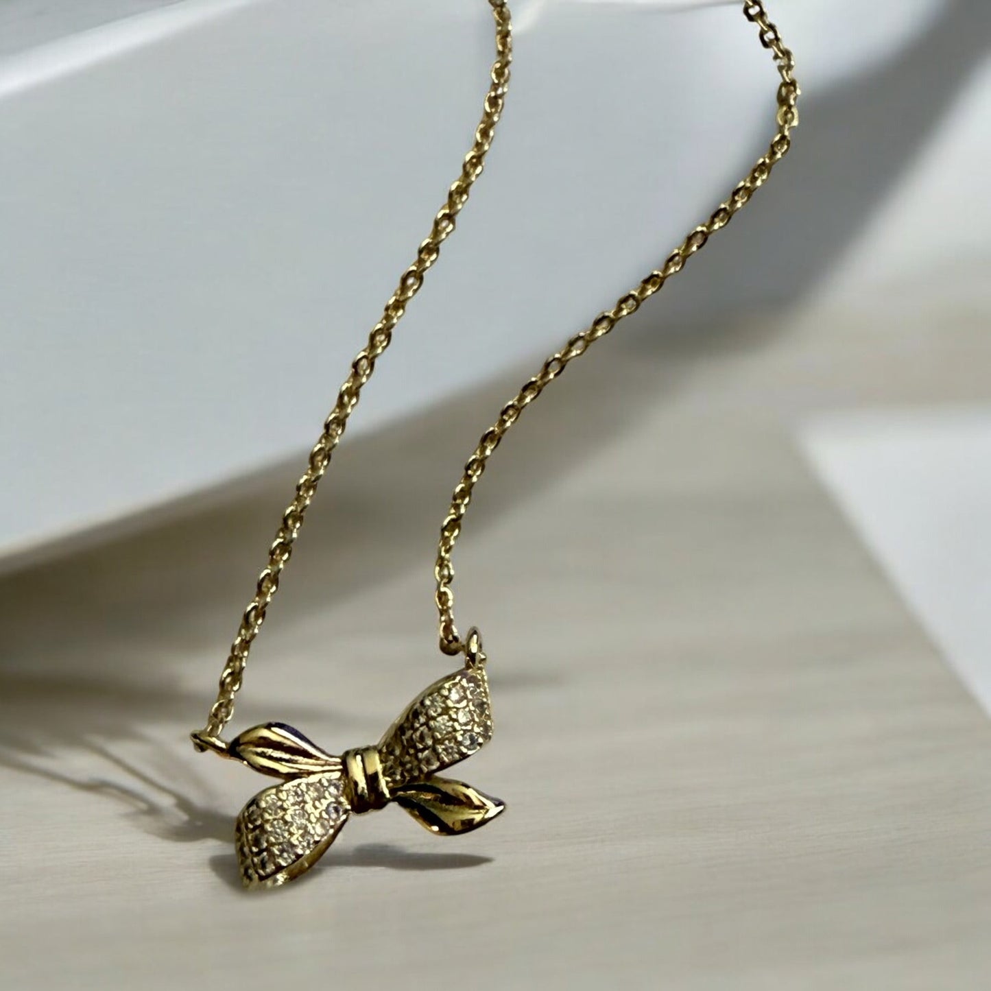 Paved CZ Bow Style 14k Gold Electroplated Necklace